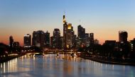 The skyline with the financial district is photographed during sunset in Frankfurt, Germany, April 22, 2020, as the spread of the coronavirus disease (COVID-19) continues. REUTERS/Kai Pfaffenbach/File Photo 