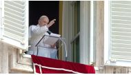 Pope Francis raises his hand in greeting as he delivers the Angelus hours before being admitted to Gemelli hospital for colon surgery, at the Vatican, July 4, 2021 in this screengrab from a Vatican Media video