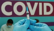 A healthcare worker prepares a dose of Sputnik V (Gam-COVID-Vac) vaccine against the coronavirus disease (COVID-19) at a vaccination centre in Gostiny Dvor in Moscow, Russia July 6, 2021. REUTERS/Tatyana Makeyeva/File Photo