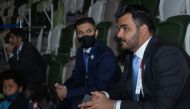 H E Sheikh Joaan bin Hamad Al Thani, Qatar Olympic Committee (QOC) President, and QOC Secretary-General Jassim bin Rashid Al Buenain attending the opening ceremony of the Tokyo 2020 Olympics at the Olympic Stadium in Tokyo, yesterday.