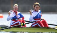 Tokyo 2020 Olympics - Rowing - Women's Pair - Medal Ceremony - Sea Forest Waterway, Tokyo, Japan - July 29, 2021 Silver medallists Vasilisa Stepanova of the Russian Olympic Committee and Elena Oryabinskaya of the Russian Olympic Committee celebrate in the
