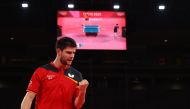 July 30, 2021. Dimitrij Ovtcharov of Germany reacts during his match against Lin Yun-Ju of Taiwan REUTERS/Thomas Peter