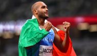 Lamont Marcell Jacobs of Italy celebrates after winning gold REUTERS/Andrew Boyers