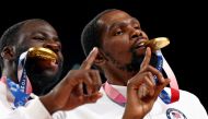  Kevin Durant of the United States and Draymond Green of the United States pose with their gold medals at the podium Reuters/Brian Snyder