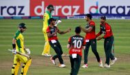 cricket - Fifth Twenty20 International - Bangladesh v Australia - Sher-e-Bangla National cricket Stadium, Dhaka, Bangladesh - August 9, 2021. Bangladesh's Shakib Al Hasan celebrates with his teammates after taking the wicket of Australia's captain Matthew