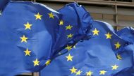 European Union flags flutter outside the EU Commission headquarters in Brussels, Belgium May 5, 2021. REUTERS/Yves Herman/File Photo