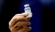 FILE PHOTO: Indian Health Minister Harsh Vardhan holds a dose of Bharat Biotech's COVID-19 vaccine called COVAXIN, during a vaccination campaign at All India Institute of Medical Sciences (AIIMS) hospital in New Delhi, India, January 16, 2021. Reuters/Adn