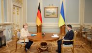 Ukrainian President Volodymyr Zelenskiy attends a meeting with German Chancellor Angela Merkel in Kyiv, Ukraine August 22, 2021. 