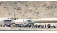 File Photo: Australian citizens and visa holders queue up to board the Royal Australian Air Force C-17A Globemaster III aircraft, as Australian Army infantry personnel provide security, at Hamid Karzai International Airport in Kabul, Afghanistan August 22