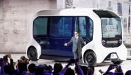 Toyota Motor Corporation President Akio Toyoda, shows the e-Palette autonomous concept vehicle at the Tokyo Motor Show, in Tokyo, Japan October 23, 2019. REUTERS/Edgar Su/File Photo
