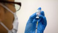 Medical staff prepare Moderna coronavirus (COVID-19) vaccine to be administered at newly-opened mass vaccination centre in Tokyo, Japan, May 24, 2021. Carl Court/Pool via REUTERS/File Photo