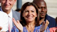 File photo: Mayor of Paris Anne Hidalgo applauds as she attends a ceremony with the French Paralympic delegation, in front of the city hall in Paris, France, September 6, 2021. REUTERS/Eric Gaillard/File Photo