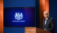 FILE PHOTO: Britain's Health Secretary Sajid Javid looks on during a news conference with Britain's Prime Minister Boris Johnson and Britain's Chancellor of the Exchequer Rishi Sunak, in Downing Street, in London, Britain, September 7, 2021. REUTERS/Toby 