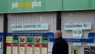 A man walks past a job centre following the outbreak of the coronavirus disease (COVID-19), in Manchester, Britain, July 8, 2020. Reuters/Phil Noble