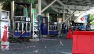 A man walks through a closed petrol station in Beirut, Lebanon September 22, 2021. REUTERS/Mohamed Azakir