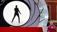 File photo: Cast member Daniel Craig poses during the world premiere of the new James Bond film 