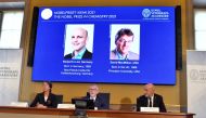 Secretary General of the Royal Swedish Academy of Sciences Goran K. Hansson, Member of the Nobel Committee for Chemistry Pernilla Wittung-Stafhede and Member of the Nobel Committee for Chemistry Peter Somfai, attend the announcement of the 2021 Nobel Priz