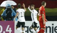 Germany's Timo Werner and Thomas Muller celebrate their first goal scored by Kai Havertz REUTERS/Ognen Teofilovski
