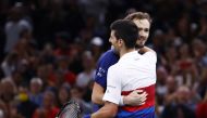  Russia's Daniil Medvedev congratulates Serbia's Novak Djokovic on winning the final match Reuters/Christian Hartmann