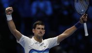 Serbia’s Novak Djokovic celebrates winning his group stage match against Russia’s Andrey Rublev REUTERS/Guglielmo Mangiapane