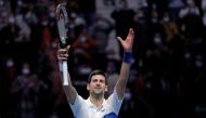 Serbia's Novak Djokovic celebrates after winning his group stage match against Britain's Cameron Norrie Reuters/Guglielmo Mangiapane 