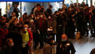 People wait in a line to get the coronavirus disease (COVID-19) vaccine at Prague's main railway station, Czech Republic, November 22, 2021. REUTERS/David W Cerny
