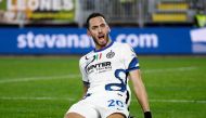 Inter Milan's Hakan Calhanoglu celebrates scoring their first goal REUTERS/Alessandro Garofalo

