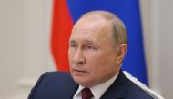 Russian President Vladimir Putin attends a session of the VTB Capital Investment Forum 