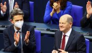 Designated German Chancellor Olaf Scholz receives applause during a session of the German lower house of parliament Bundestag to elect a new chancellor, in Berlin, Germany, December 8, 2021. Reuters/Fabrizio Bensch