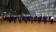European Council President Charles Michel and European Commission President Ursula von der Leyen pose for a family photo with leaders of EU countries and the governments of the 