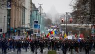 People attend a demonstration against the Belgian government's restrictions imposed to contain the spread of the coronavirus disease (COVID-19) in Brussels, Belgium, December 19, 2021. REUTERS/Johanna Geron

