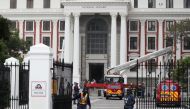 Firefighters work after a fire broke out in the Parliament in Cape Town, South Africa, January 2, 2022. Reuters/Sumaya Hisham