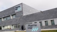 Workers walk outside the Spanish pharmaceutical company PharmaMar, amid the coronavirus disease (COVID-19) outbreak, in Colmenar Viejo, Spain January 26, 2021. REUTERS/Susana Vera


