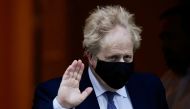 British Prime Minister Boris Johnson gestures as he leaves Downing Street to attend Prime Minister's Questions in Parliament, in London, Britain, January 5, 2022. REUTERS/Toby Melville/File Photo