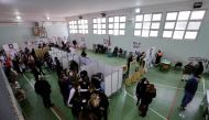 Pupils receive coronavirus disease (COVID-19) vaccinations at a primary school in Naples, Italy, January 12, 2022. REUTERS/Ciro De Luca/File Photo