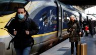 Passengers arrive at the Eurostar terminal at Gare du Nord train station, after France eased travel restrictions for travellers from Britain amid the spread of the coronavirus disease (COVID-19) pandemic, in Paris, France, January 14, 2022. REUTERS/Noemie Olive