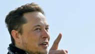 Tesla CEO Elon Musk gestures as he visits the construction site of Tesla's Gigafactory in Gruenheide near Berlin, Germany, August 13, 2021. Patrick Pleul/Pool via Reuters

