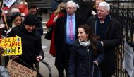 Stella Moris, partner of WikiLeaks founder Julian Assange, and WikiLeaks Editor in Chief Kristinn Hrafnsson walk outside the Royal Courts of Justice following the appeal against Assange's extradition in London, Britain, January 24, 2022. Reuters/Henry Nicholls