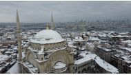 Nuruosmaniye Mosque in Eminonu district is seen during heavy snowfall in Istanbul, Turkey January 25, 2022. Picture taken with a drone. REUTERS/Umit Bektas