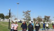 Officials from Ministry of Transport and transportation sector entities taking part in National Sport Day celebrations, yesterday.