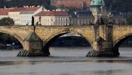 FILE PHOTO: A man rides a pedal boat on the Vltava river in Prague, Czech Republic, October 21, 2020. REUTERS/David W Cerny/File Photo
