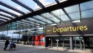 A passenger arrives at Gatwick Airport, as travel restrictions are eased following the coronavirus disease (COVID-19) outbreak, in Gatwick, Britain July 10, 2020. REUTERS/Toby Melville