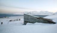 File photo: Television crews stand outside the Global Seed Vault before the opening ceremony in Longyearbyen, February 26, 2008. Reuters/Bob Strong 