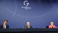 German Chancellor Olaf Scholz, state premier of North Rhine-Westphalia Hendrik Wuest and Berlin Mayor Franziska Giffey address the media during a news conference following a meeting with the 16 state leaders on latest coronavirus disease (COVID-19) measures in Berlin, Germany February 16, 2022. REUTERS/Michele Tantussi/Pool
