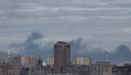 Smoke rises after shelling in Kyiv, Ukraine February 27, 2022. REUTERS/Gleb Garanich