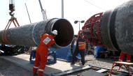FILE PHOTO: Workers are seen at the construction site of the Nord Stream 2 gas pipeline, near the town of Kingisepp, Leningrad region, Russia, June 5, 2019. REUTERS/Anton Vaganov