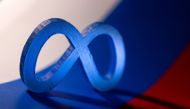 Meta logo is placed on a Russian flag in this illustration taken February 26, 2022. Reuters/Dado Ruvic/Illustration
