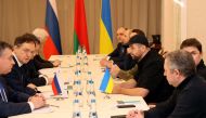 FILE PHOTO: Russian and Ukrainian officials take part in the talks in the Gomel region, Belarus February 28, 2022. Sergei Kholodilin/BelTA/Handout via REUTERS 