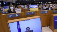 Ukrainian President Volodymyr Zelenskiy addresses the European Parliament special session, from a screen, to debate its response to the Russian invasion of Ukraine, in Brussels, Belgium March 1, 2022. Reuters/Yves Herman