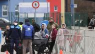 People fleeing the Russian invasion of Ukraine, arrive in Vysne Nemecke, Slovakia, March 1, 2022. REUTERS.